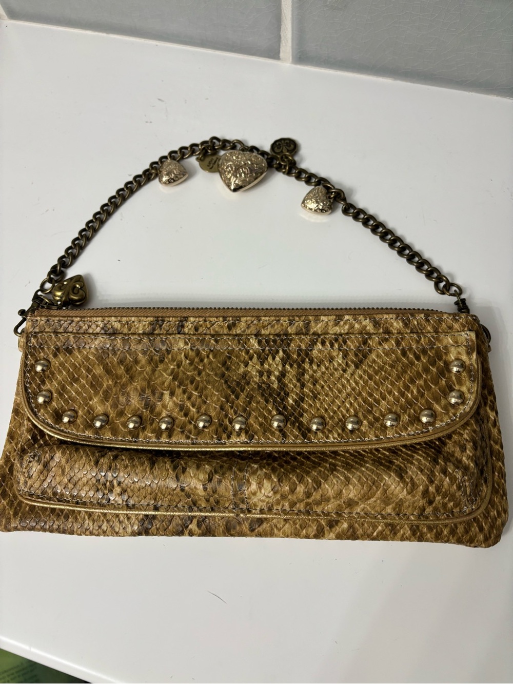 Kathy Van Zeeland snake print clutch